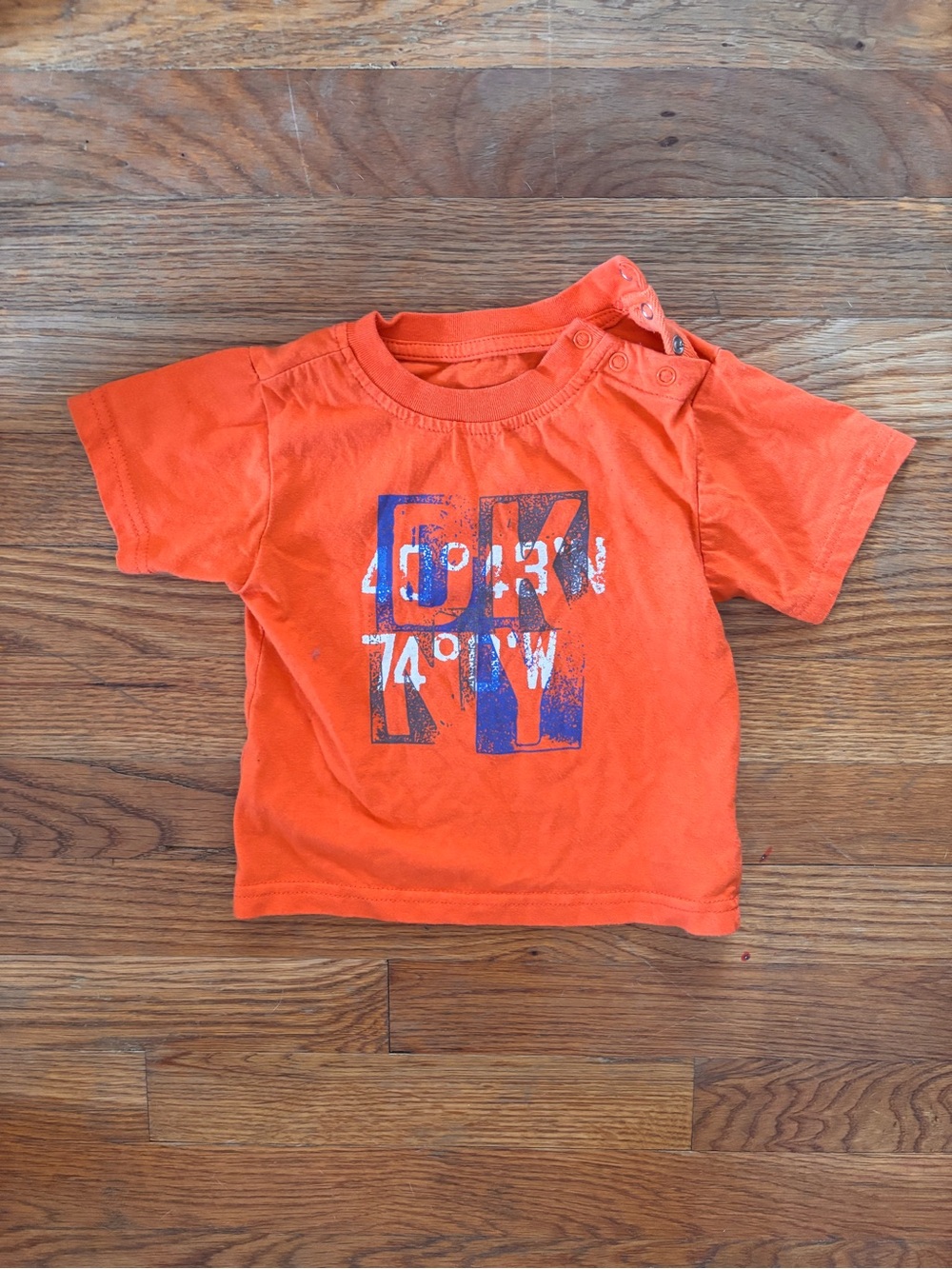 DKNY Orange Short Sleeve Tee with Blue Graphic
